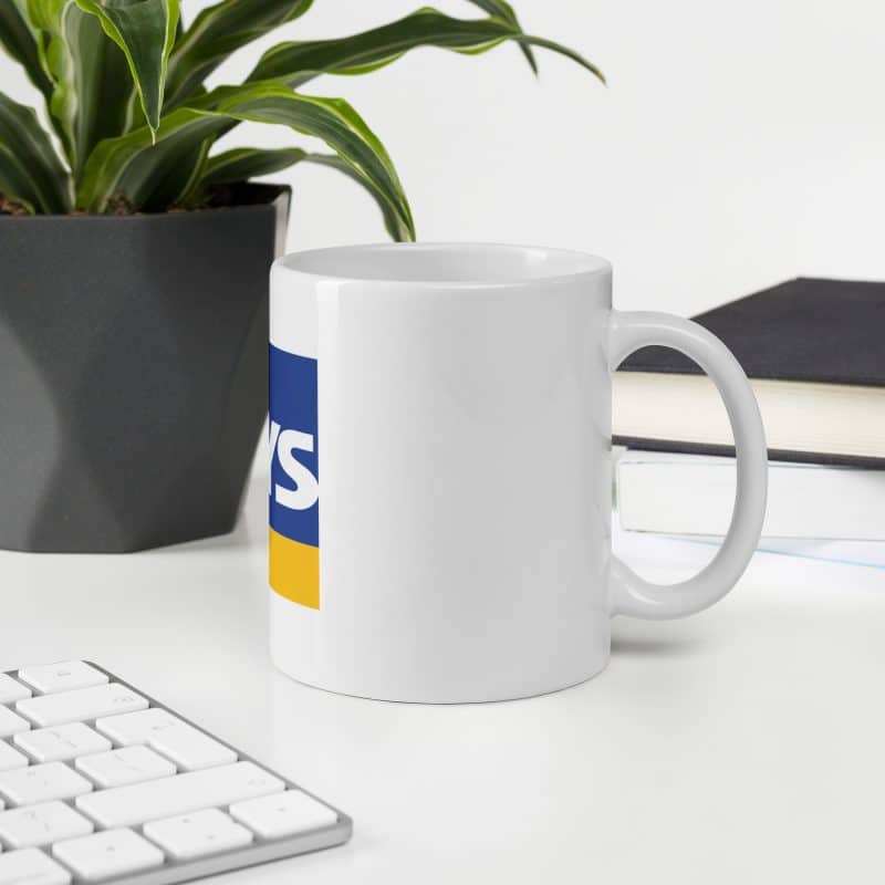 white glossy mug white 11 oz office environment 6658e63916ff4.jpg